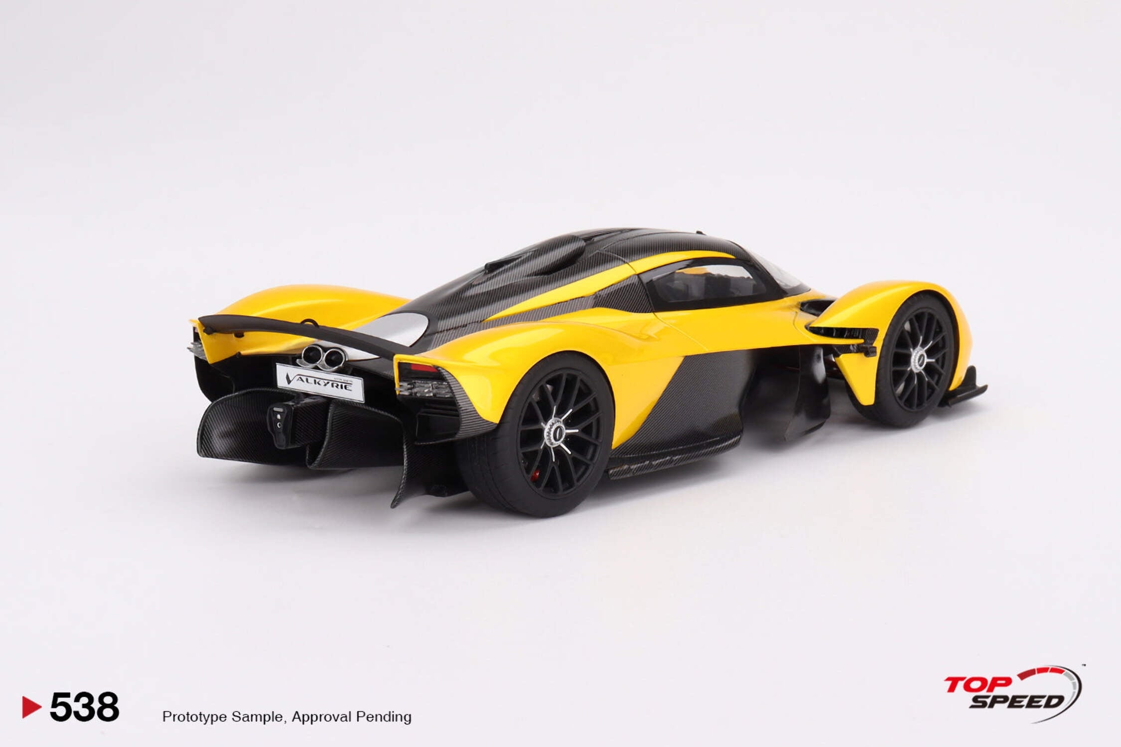 Aston Martin Valkyrie Cosmopolitan Yellow Metallic and Carbon 1/18 Model Car by Top Speed