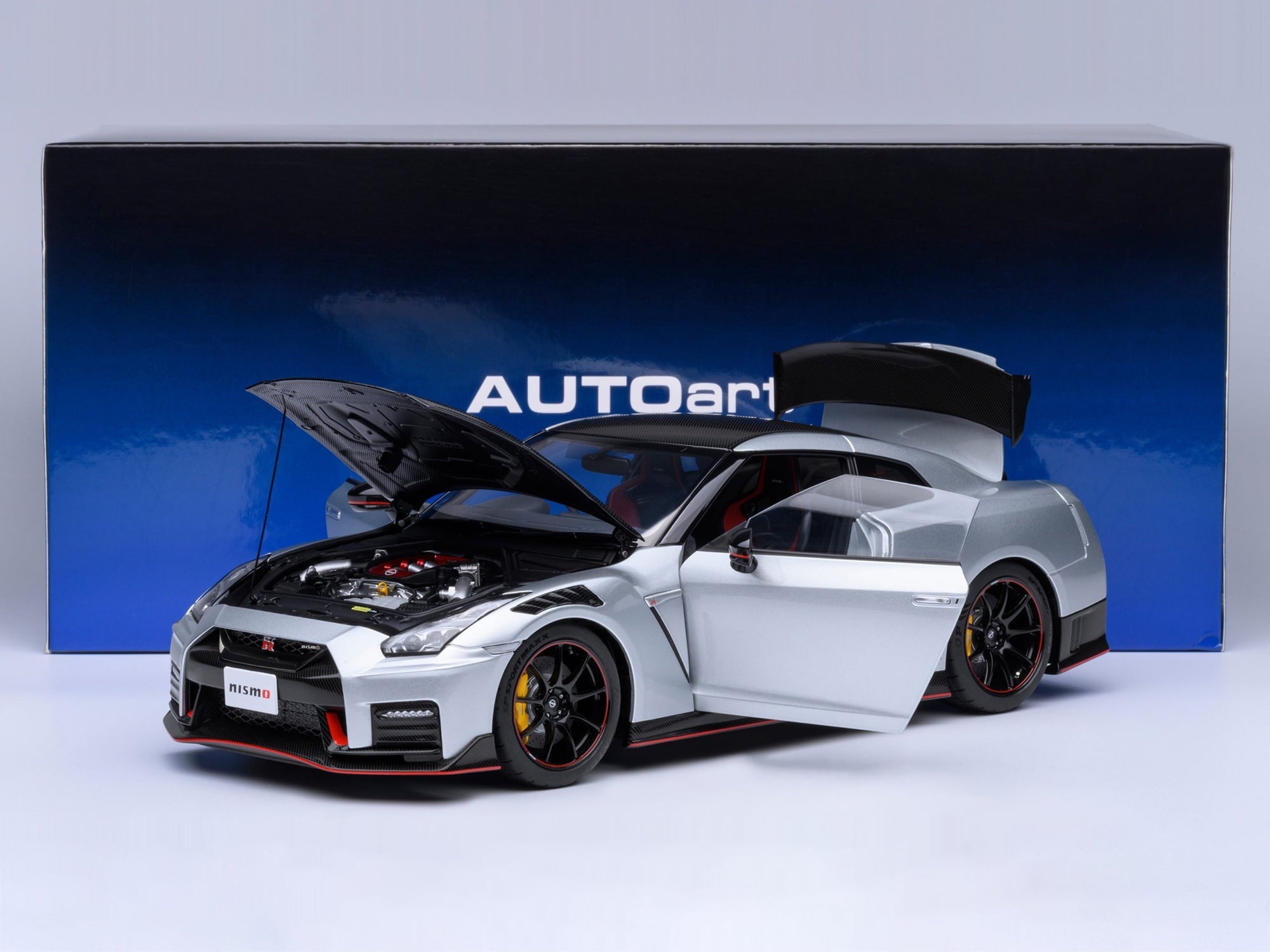 2022 Nissan GT-R (R35) Nismo Special Edition RHD Ultimate Metal Silver with Carbon Hood and Top 1/18 Model Car by Autoart