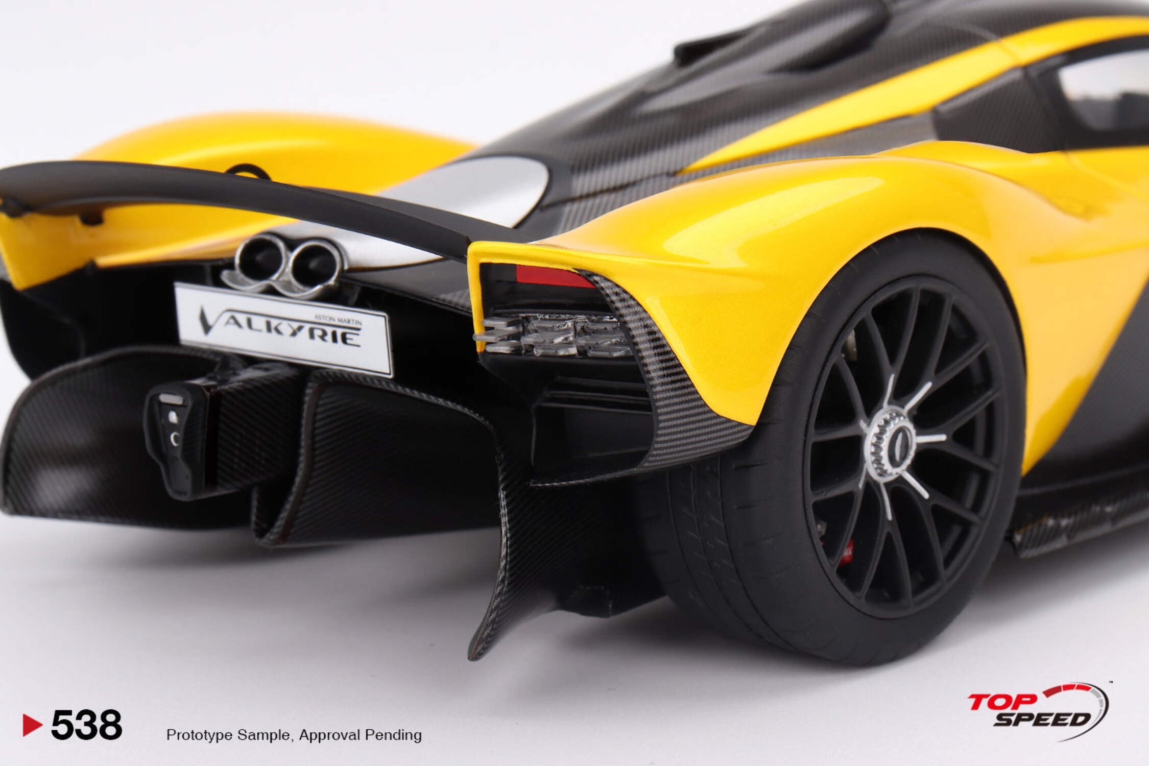 Aston Martin Valkyrie Cosmopolitan Yellow Metallic and Carbon 1/18 Model Car by Top Speed