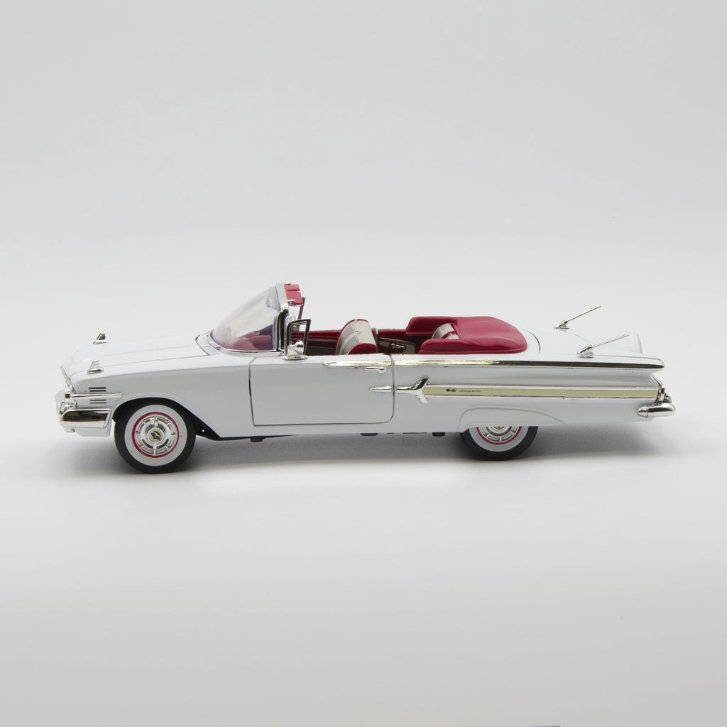 1960 Chevrolet Impala Convertible Blue 1/18 Diecast Car Model by Motormax