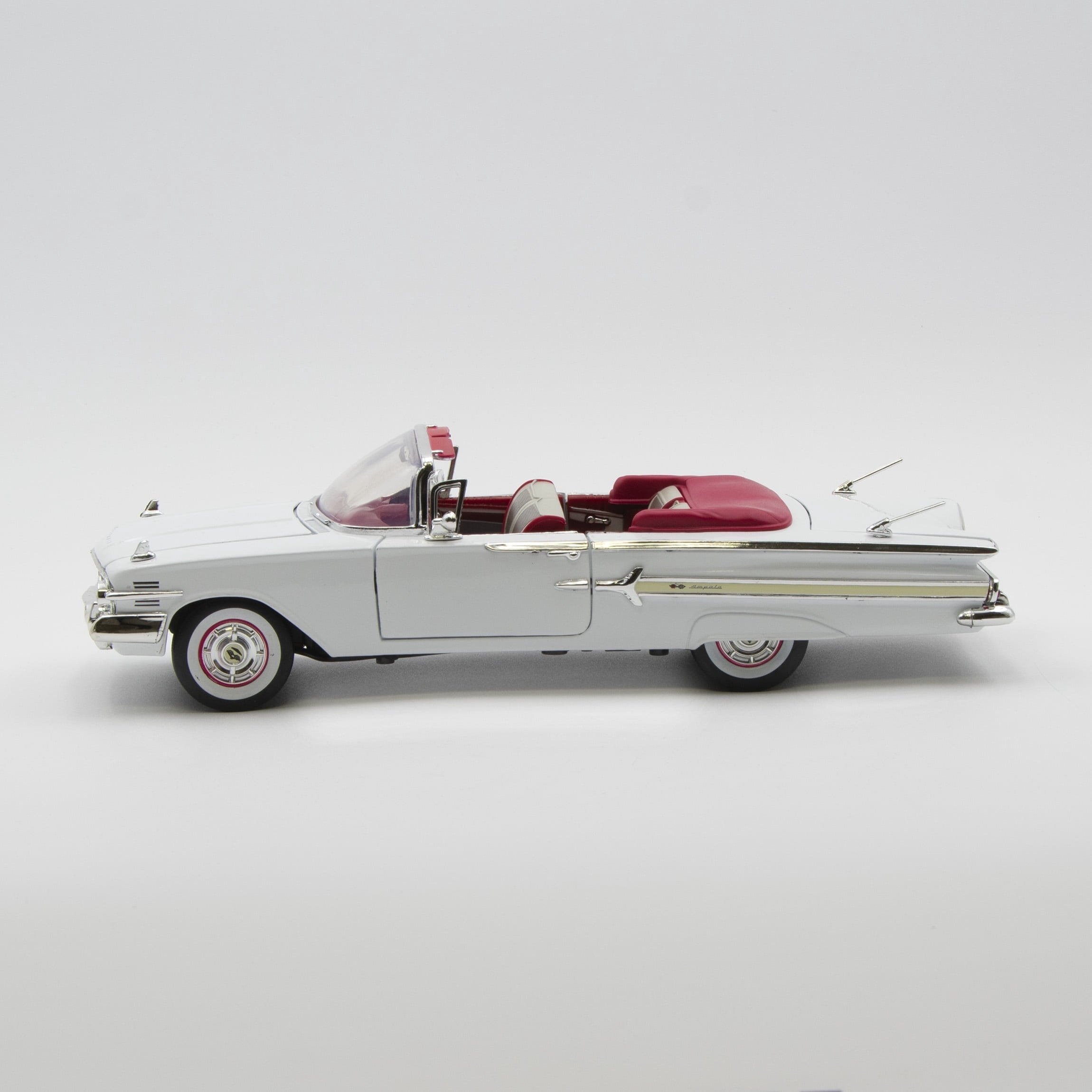 1960 Chevrolet Impala Convertible Blue 1/18 Diecast Car Model by Motormax