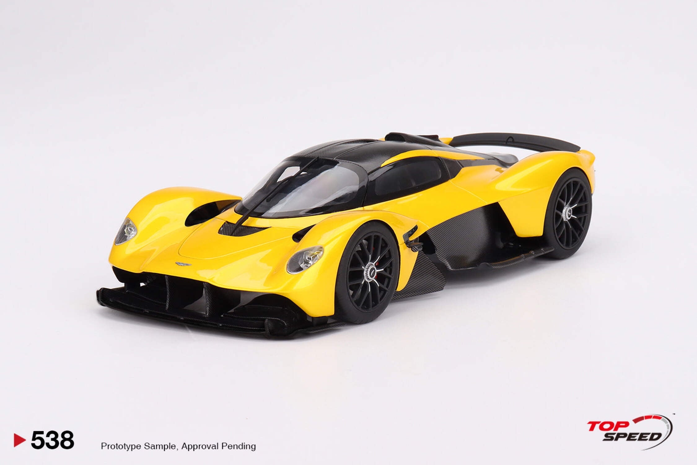 Aston Martin Valkyrie Cosmopolitan Yellow Metallic and Carbon 1/18 Model Car by Top Speed