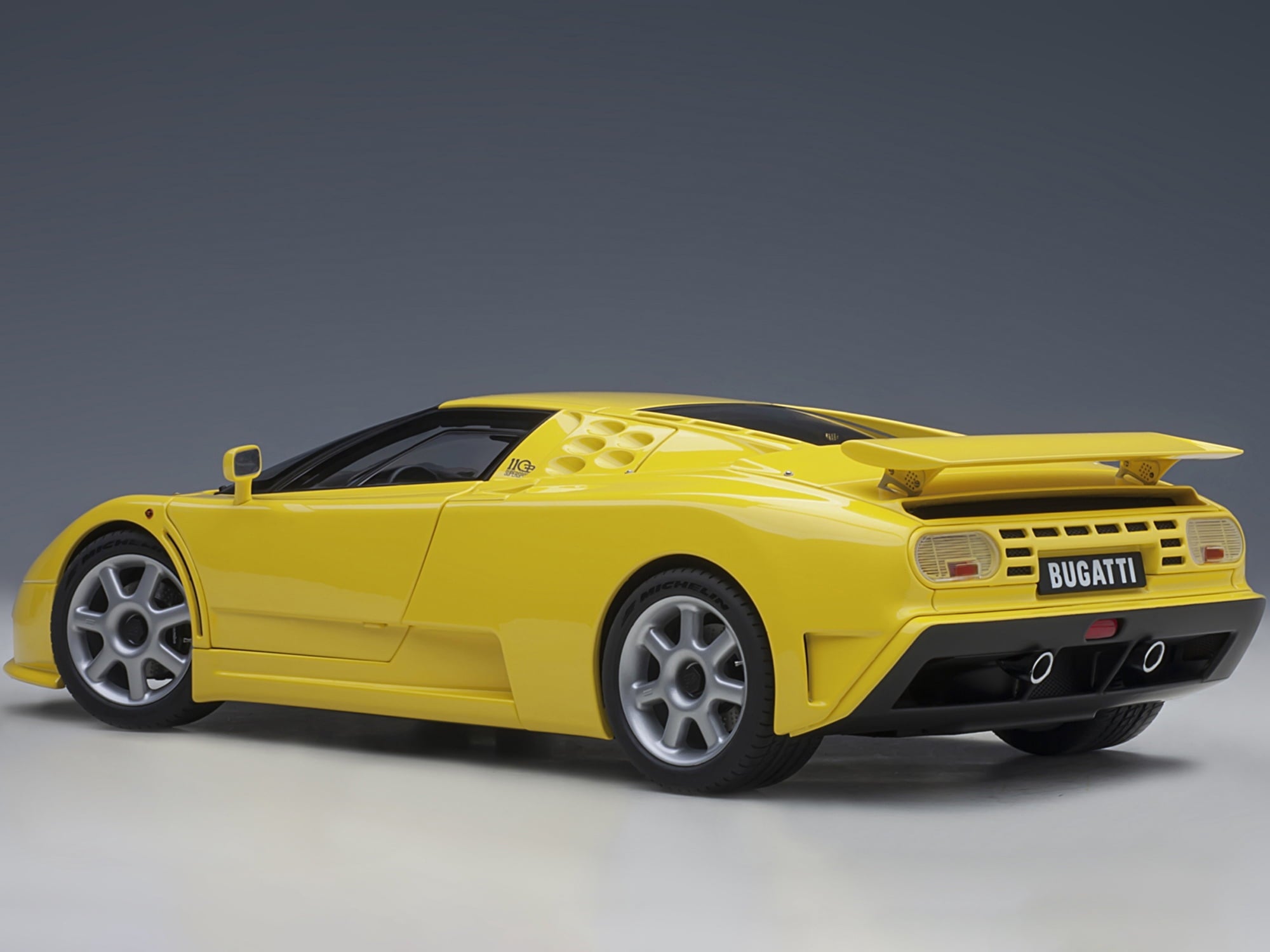 Bugatti EB110 SS Super Sport Giallo Bugatti Yellow with Silver Wheels 1/18 Model Car by Autoart