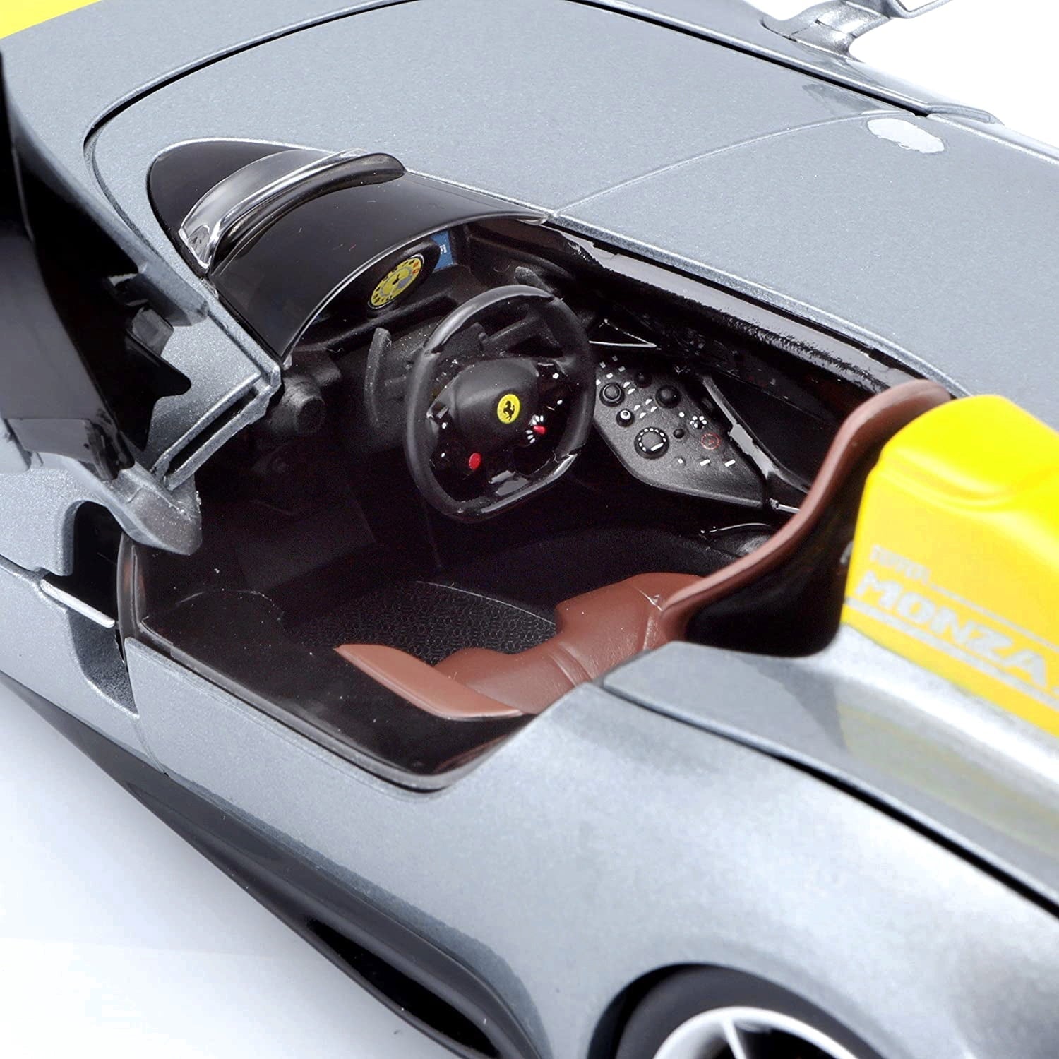 Ferrari Monza SP1 Silver Metallic with Yellow Stripes 1/18 Diecast Model Car by Bburago