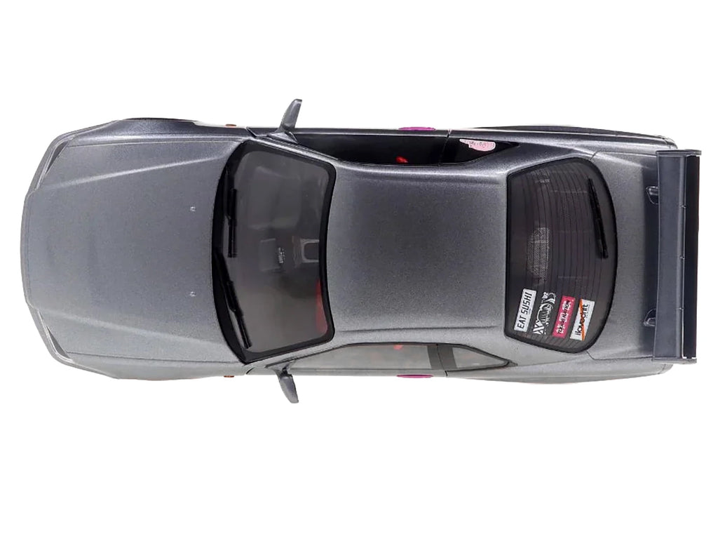 1999 Nissan Skyline GT-R (R34) RHD (Right Hand Drive) Silver Metallic with Purple Wheels 1/18 Diecast Model Car by Solido