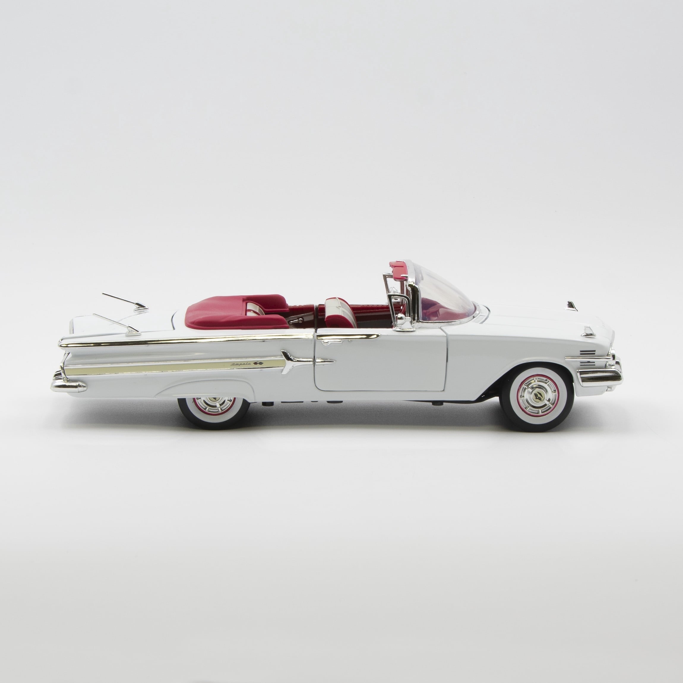 1960 Chevrolet Impala Convertible Blue 1/18 Diecast Car Model by Motormax